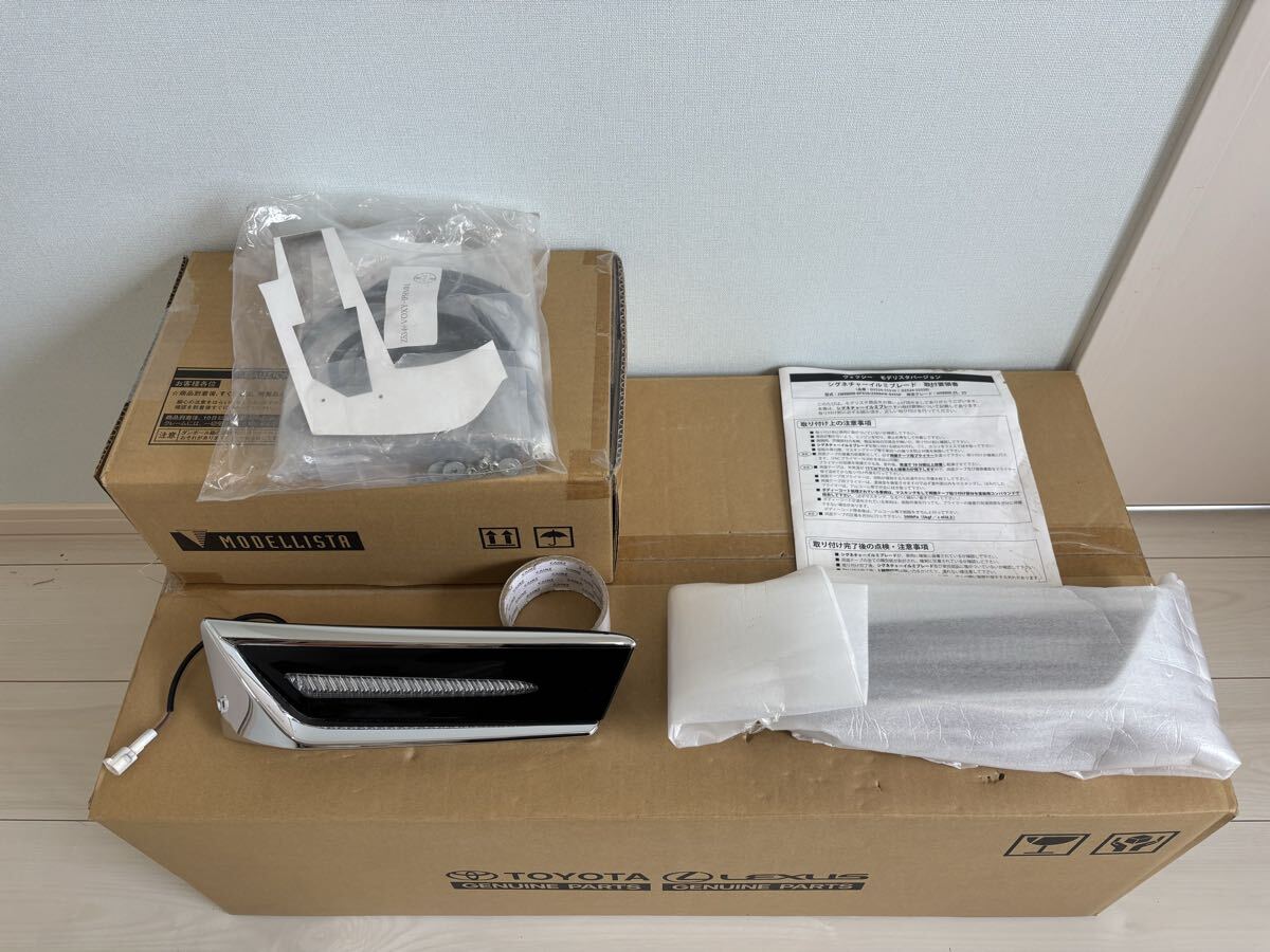новый товар / одна строна  б/у, но в хорошем состоянии 　 Voxy  　ZRR80/ZRR85/ZWR80　80 кузов 　 после рестайлинга 　MODELLISTA　 Modellista 　... подсветка  лезвие  　  хром  тип