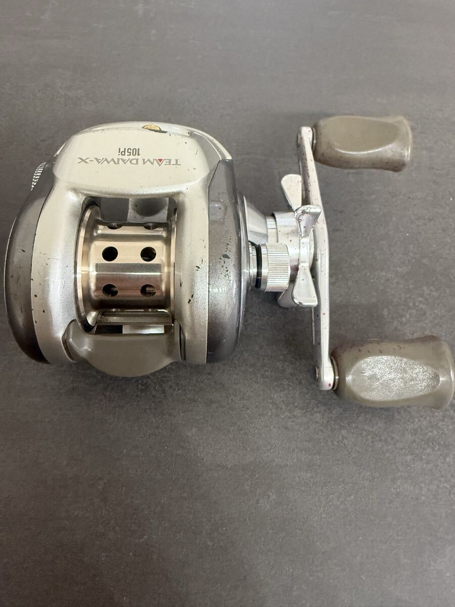 Daiwa   команда   Daiwa  TD-X105Pi TEAM DAIWA ... катушка   сделано в Японии